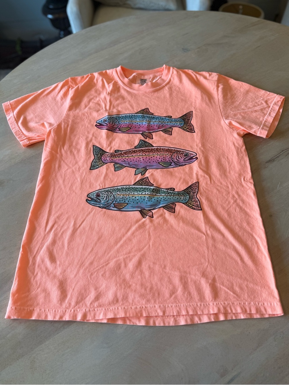 New, never worn, Comfort Colors Coral Pink Tee with Three Rainbow Trout Graphic